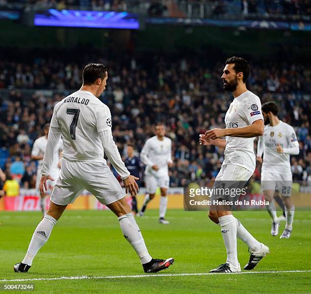 Cristiano Ronaldo and Alvaro Arbeloa of Real Madrid celebrate after scoring during the UEFA Champions League Group A match between Real Madrid and...