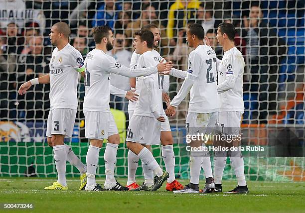 The players of Real Madrid celebrate after scoring during the UEFA Champions League Group A match between Real Madrid and Malmo FF at Estadio...