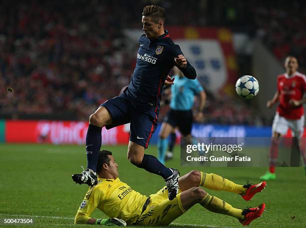 Club Atletico de Madrid's forward Fernando Torres with SL Benfica's goalkeeper Julio Cesar in action during the UEFA Champions League match between...