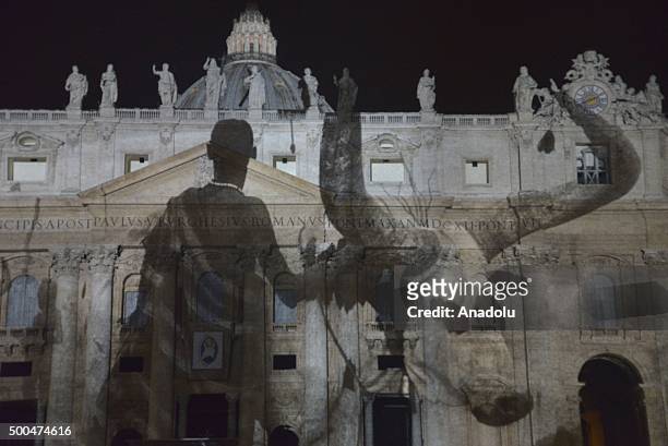 An image is seen as it is projected on St. Peters Basilica's front side during the show Fiat Lux : Illuminating Our Common Home within the Roman...