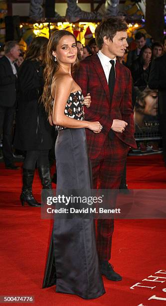 Alicia Vikander and Eddie Redmayne attend the UK Premiere of "The Danish Girl" at Odeon Leicester Square on December 8, 2015 in London, United...