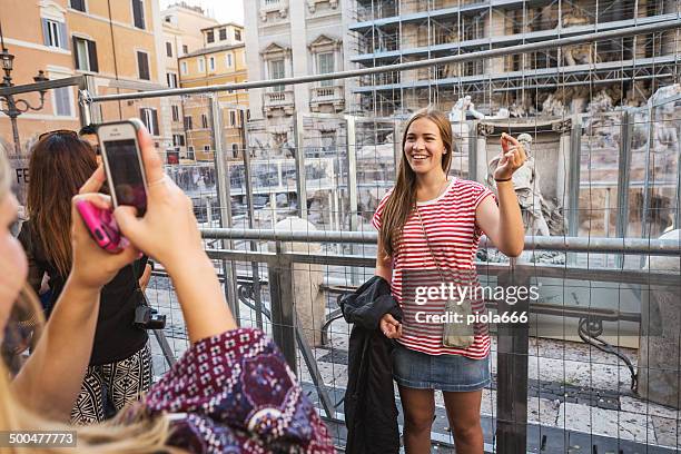 trevi fountain renovation sponsored by fendi, in rome - coin fountain stock pictures, royalty-free photos & images