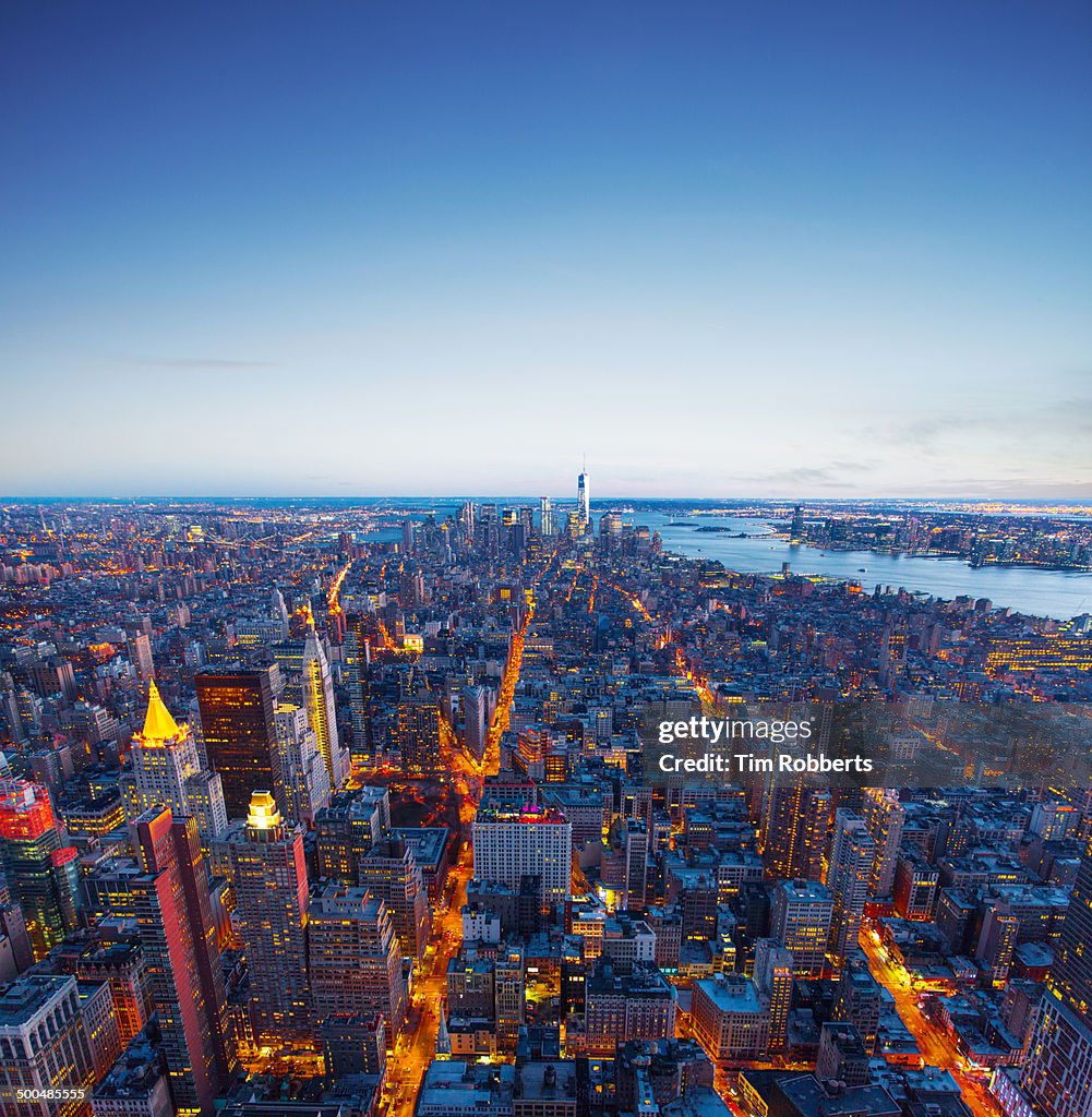 Manhattan at dusk with The Freedom Tower.