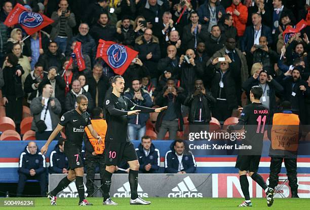 Zlatan Ibrahimovic of Paris Saint-Germain celebrate his goal with Angel Di Maria and Lucas Moura during the UEFA Champions League between Paris...