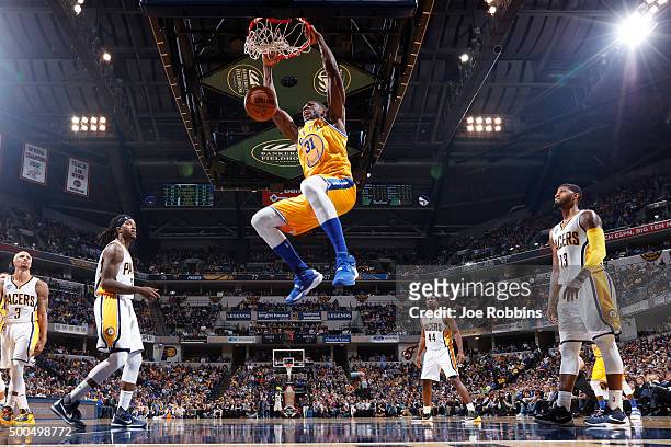 Festus Ezeli of the Golden State Warriors dunks the ball against the Indiana Pacers in the second half of the game at Bankers Life Fieldhouse on...