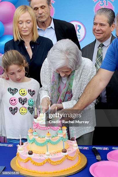 Baskin family members Goldie Baskin, Edie Baskin, Richard Baskin, Shirley Baskin Familian, and Burbank's Mayor Bob Frutos make the first cut during...