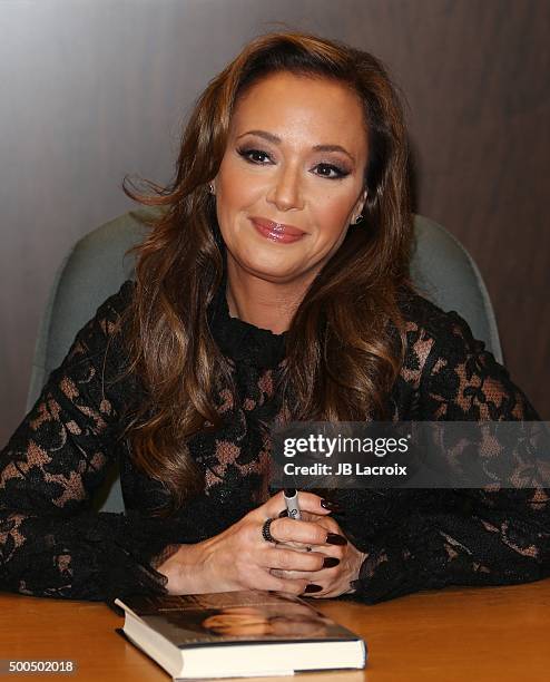 Leah Remini signs copies of her new book "Troublemaker: Surviving Hollywood and Scientology" on December 8, 2015 in Los Angeles, California.