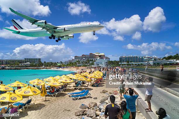 Commercial airline landing at the Princess Juliana International Airport in St Maarten.