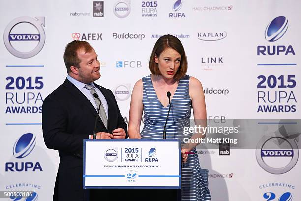 Event hosts Benn Robinson and Georgina Robinson speak during the 2015 Rugby Unions Players Association Awards at The Ivy on December 9, 2015 in...