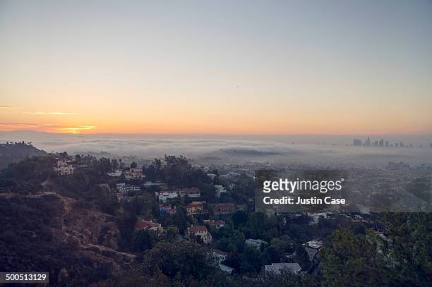 downward view of sunrise towards los angeles - hollywood california stock-fotos und bilder