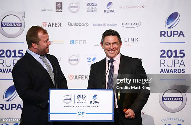 Rod Kafer accepts the Medal For Excellence Award on behalf of David Pocock during the 2015 Rugby Unions Players Association Awards at The Ivy on...