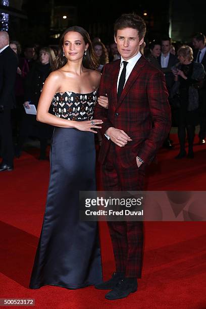 Alicia Vikander and Eddie Redmayne attend the UK Premiere of "The Danish Girl" at Odeon Leicester Square on December 8, 2015 in London, England.