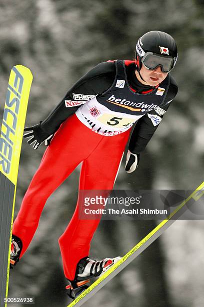 Takanobu Okabe of Japan competes in the first jump during the Men's Team event of the FIS Ski Jumping World Cup Willingen on February 5, 2006 in...