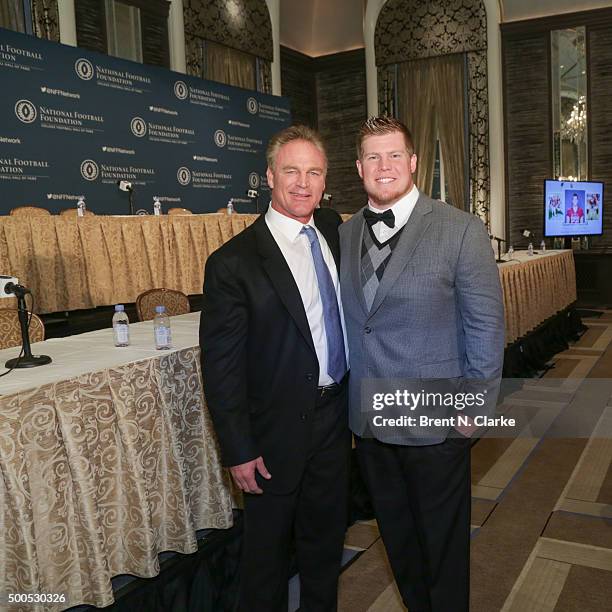 College Football Hall of Fame class member Brian Bosworth and the recipient of the 2015 Wuerffel Trophy Ty Darlington pose for photographs during the...