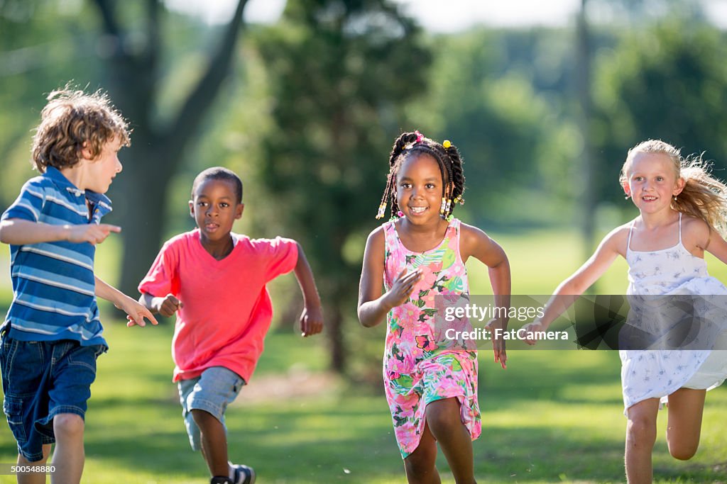 Children Running Through the Park