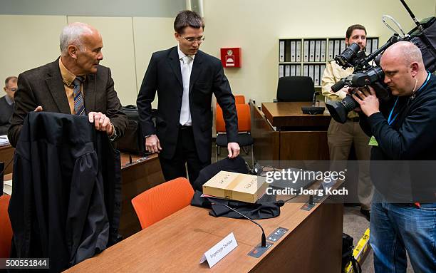 Mathias Grasel and Hermann Borchert , lawyers of Beate Zschaepe, the main defendant in the NSU neo-Nazi murder trial, prepare for the start of day...