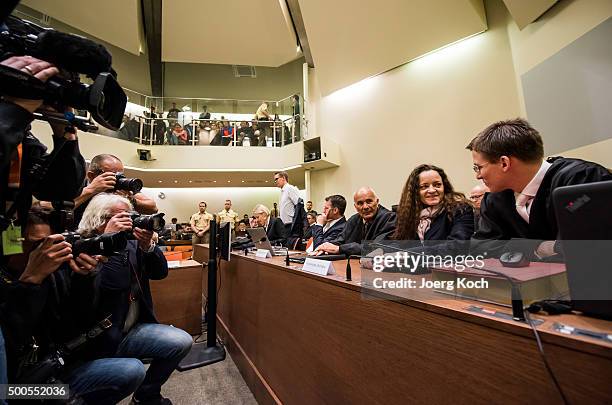 Beate Zschaepe , the main defendant in the NSU neo-Nazi murder trial, talks with her lawyers, Mathias Grasel , Hermann Borchert, Wolfgang Stahl,...