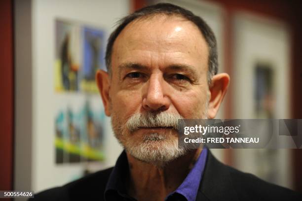 Italian artist Lorenzo Mattotti poses for a photograph during his exhibition "Infini" at the Fonds Helene et Edouard Leclerc culture centre in...