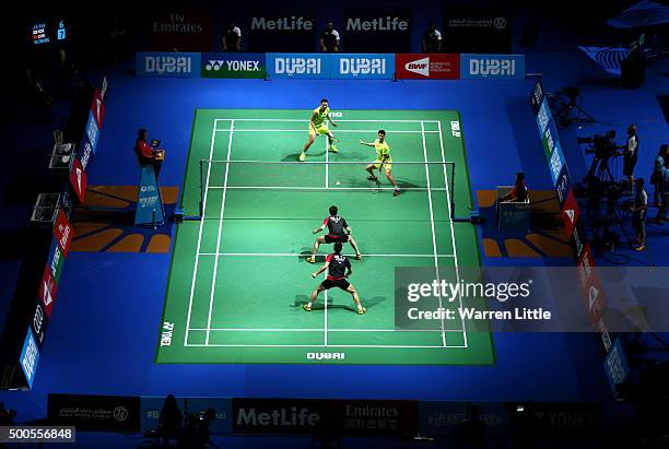 Haifeng Fu and Nan Zhang of China play Yong Dae Lee and Yeon Seong Yoo of Korea in the Men's Doubles match during day one of the BWF Dubai World...