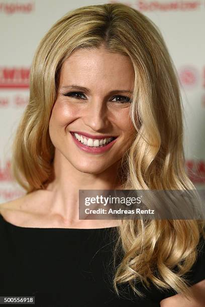 Michelle Hunziker attends a photocall to promote original swiss cheese, Schweizer Emmentaler AOP on December 9, 2015 in Cologne, Germany.