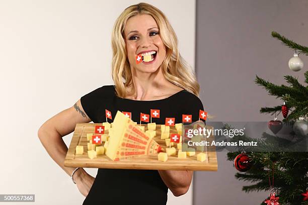 Michelle Hunziker attends a photocall to promote original swiss cheese, Schweizer Emmentaler AOP on December 9, 2015 in Cologne, Germany.