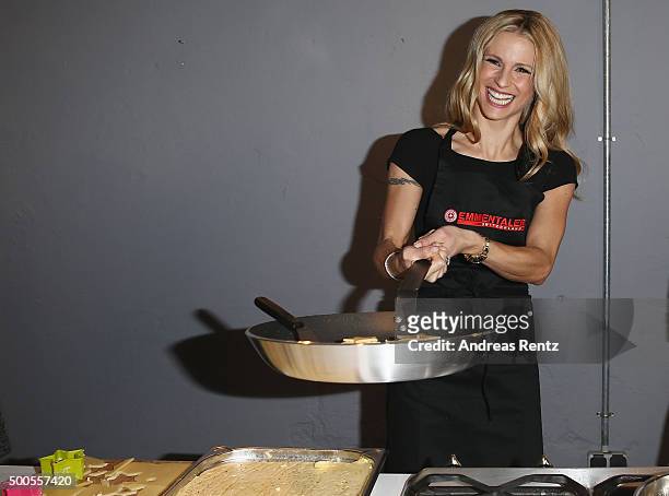 Michelle Hunziker attends a photocall to promote original swiss cheese, Schweizer Emmentaler AOP on December 9, 2015 in Cologne, Germany.