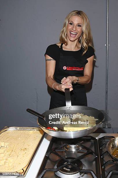 Michelle Hunziker attends a photocall to promote original swiss cheese, Schweizer Emmentaler AOP on December 9, 2015 in Cologne, Germany.