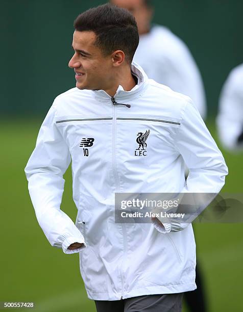 Philippe Coutinho of Liverpool warms up during the Liverpool training session at the Melwood training ground on December 9, 2015 in Liverpool,...