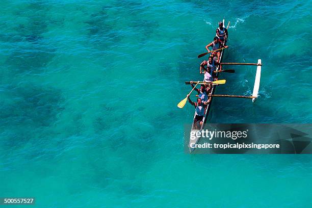 racing outrigger canoe - outrigger stock pictures, royalty-free photos & images