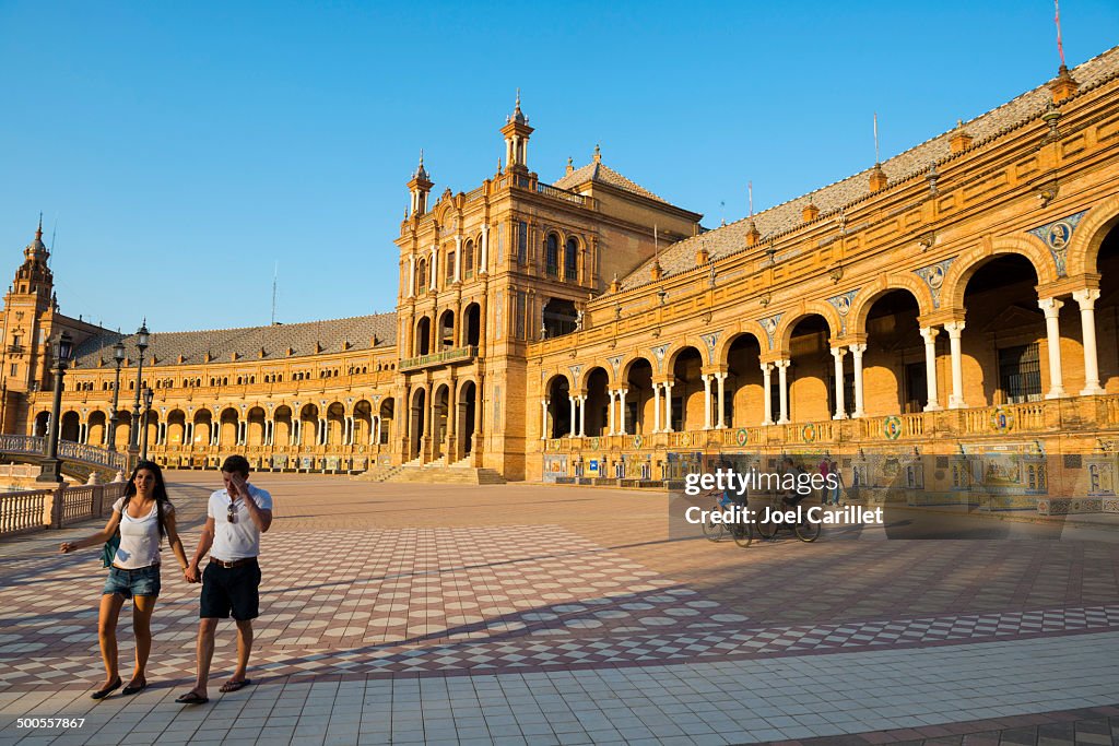People in Seville's Plaza de Espana