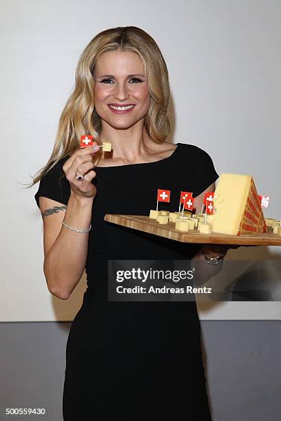 Michelle Hunziker attends a photocall to promote original swiss cheese, Schweizer Emmentaler AOP on December 9, 2015 in Cologne, Germany.