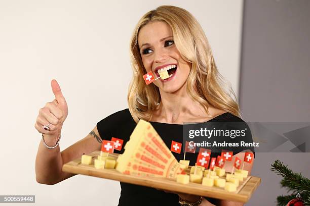 Michelle Hunziker attends a photocall to promote original swiss cheese, Schweizer Emmentaler AOP on December 9, 2015 in Cologne, Germany.