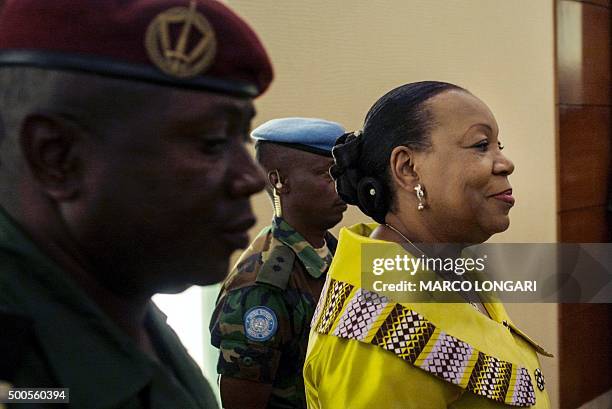 Central African Republic transitional President Catherine Samba Panza arrives at the Ledger hotel in Bangui on December 9, 2015 for the signing of a...