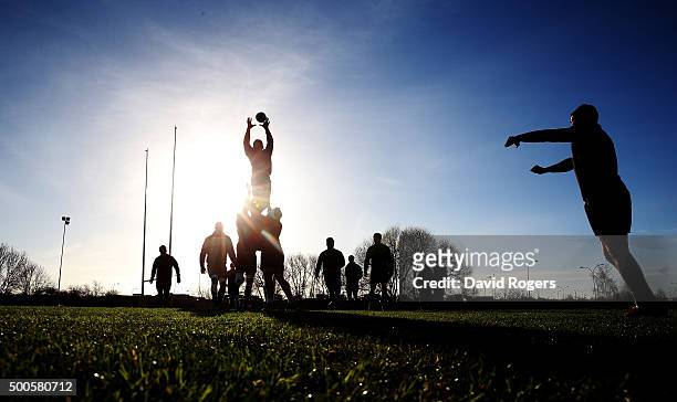 Silhouette of the Saints practicing their lineouts during the Northampton Saints training session held at Franklin's Gardens on December 9, 2015 in...