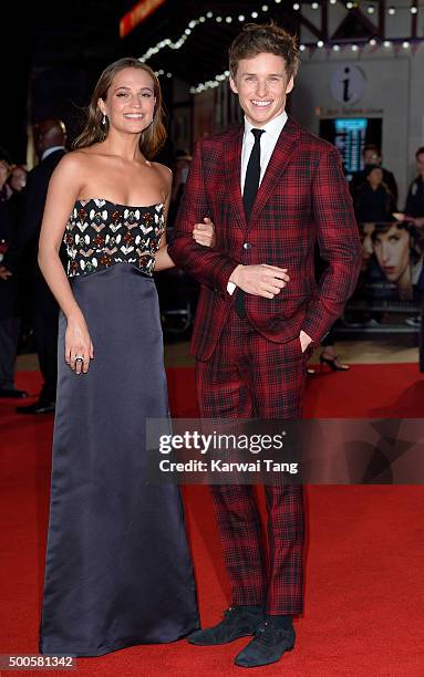 Eddie Redmayne and Alicia Vikander attend the UK Film Premiere of "The Danish Girl" on December 8, 2015 in London, United Kingdom.