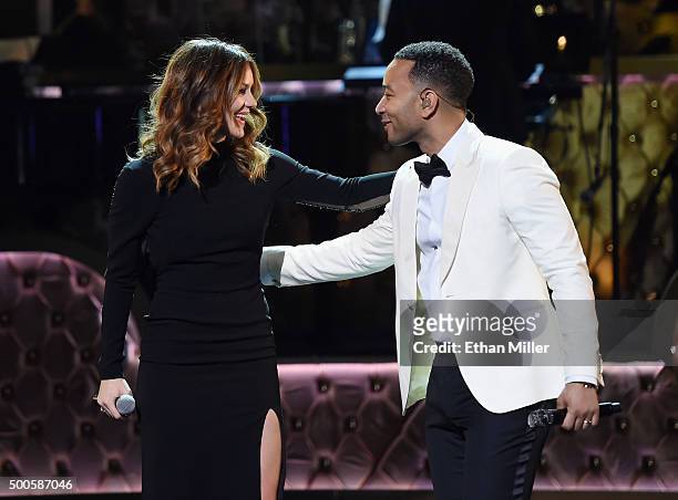 Singer Katharine McPhee and recording artist John Legend perform during "Sinatra 100: An All-Star GRAMMY Concert" celebrating the late Frank...