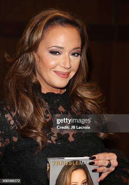 Leah Remini signs copies of her new book "Troublemaker: Surviving Hollywood and Scientology" on December 8, 2015 in Los Angeles, California.