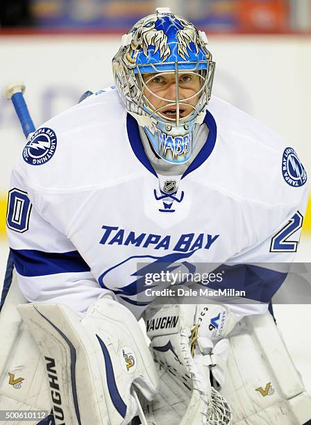 Goaltender Evgeni Nabokov of the Tampa Bay Lightning warms up before the game against the Calgary Flames at Scotiabank Saddledome on October 21, 2014...