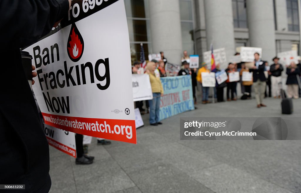 Protesters gathered out front of the Colorado Supreme Court Building to protest fracking before a hearing on local communities and fracking