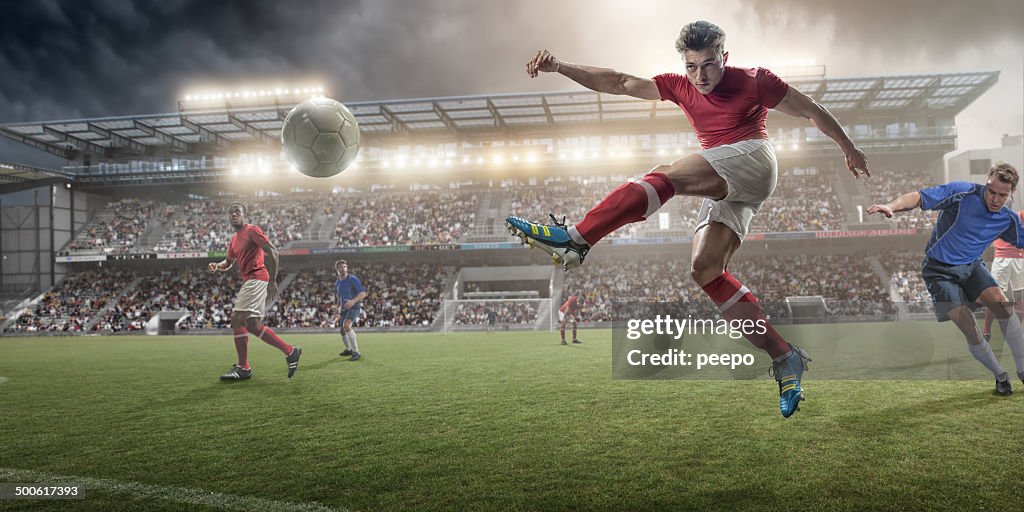 Soccer Player Kicking Ball