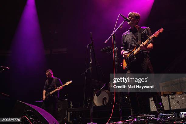 Nick Harmer, Jason McGerr and Ben Gibbard of Death Cab for Cutie perform on stage during Deck The Hall Ball hosted by 107.7 The End at KeyArena on...