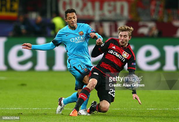 Adriano of Barcelona and Christoph Kramer of Bayer Levekusen in action during the UEFA Champions League Group E match between Bayer 04 Leverkusen and...