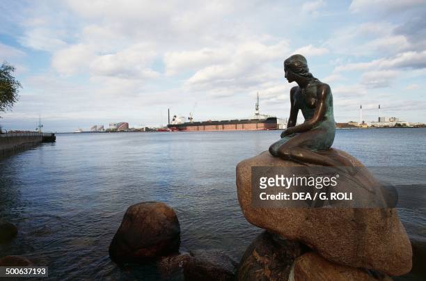 The statue of the Little Mermaid at the entrance to the harbour, by Edward Eriksen , Copenhagen, Denmark.