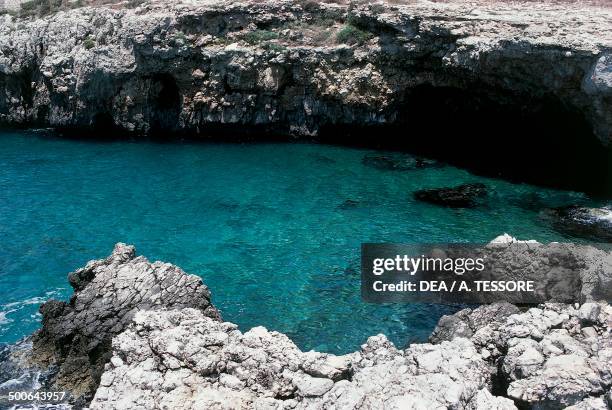 Rocky coast at Lido Conchiglie, Gallipoli, Apulia, Italy.