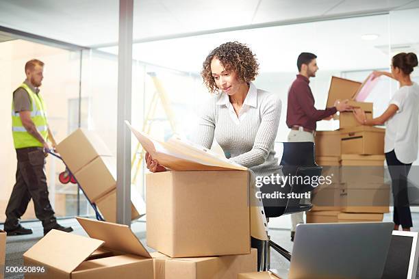 new office move day - moving office stock pictures, royalty-free photos & images