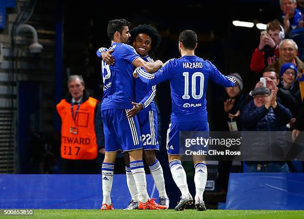 Willian of Chelsea celebrates with Diego Costa and Eden Hazard of Chelsea as he scores their second goal during the UEFA Champions League Group G...