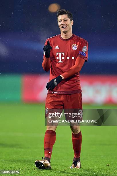 Bayern Munich's Polish striker Robert Lewandowski celebrates after scoring during the UEFA Champions League football match between Dinamo Zagreb v...