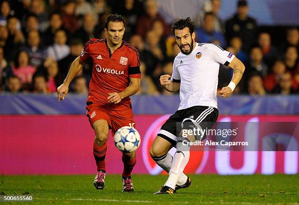 Jeremy Morel of Lyon and Alvaro Negredo of Valencia in action during the UEFA Champions League Group H match between Valencia CF and Olympique...