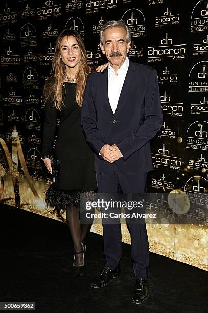Imanol Arias and Irene Meritxell attend the charity "Chocron Calendar" presentation at the Neptuno Palace on December 9, 2015 in Madrid, Spain.