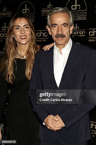 Imanol Arias and Irene Meritxell attend the charity "Chocron Calendar" presentation at the Neptuno Palace on December 9, 2015 in Madrid, Spain.